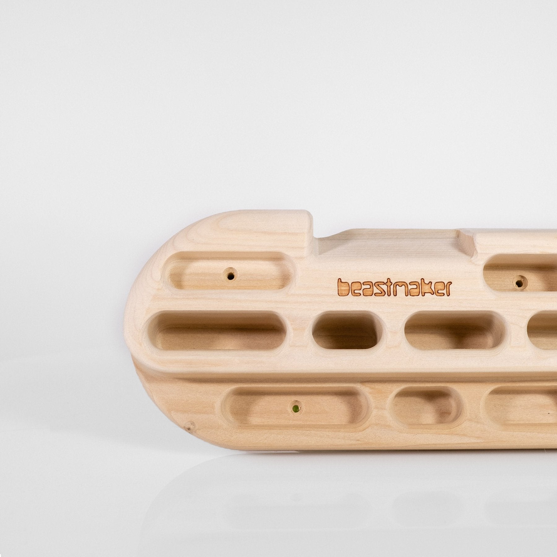 close up of So iLL distribution Beastmaker 1000 wooden climbing hangboard