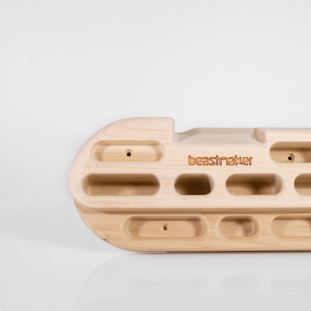 close up of So iLL distribution Beastmaker 1000 wooden climbing hangboard