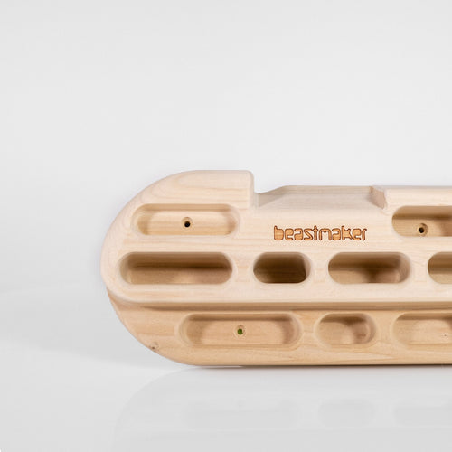 close up of So iLL distribution Beastmaker 1000 wooden climbing hangboard