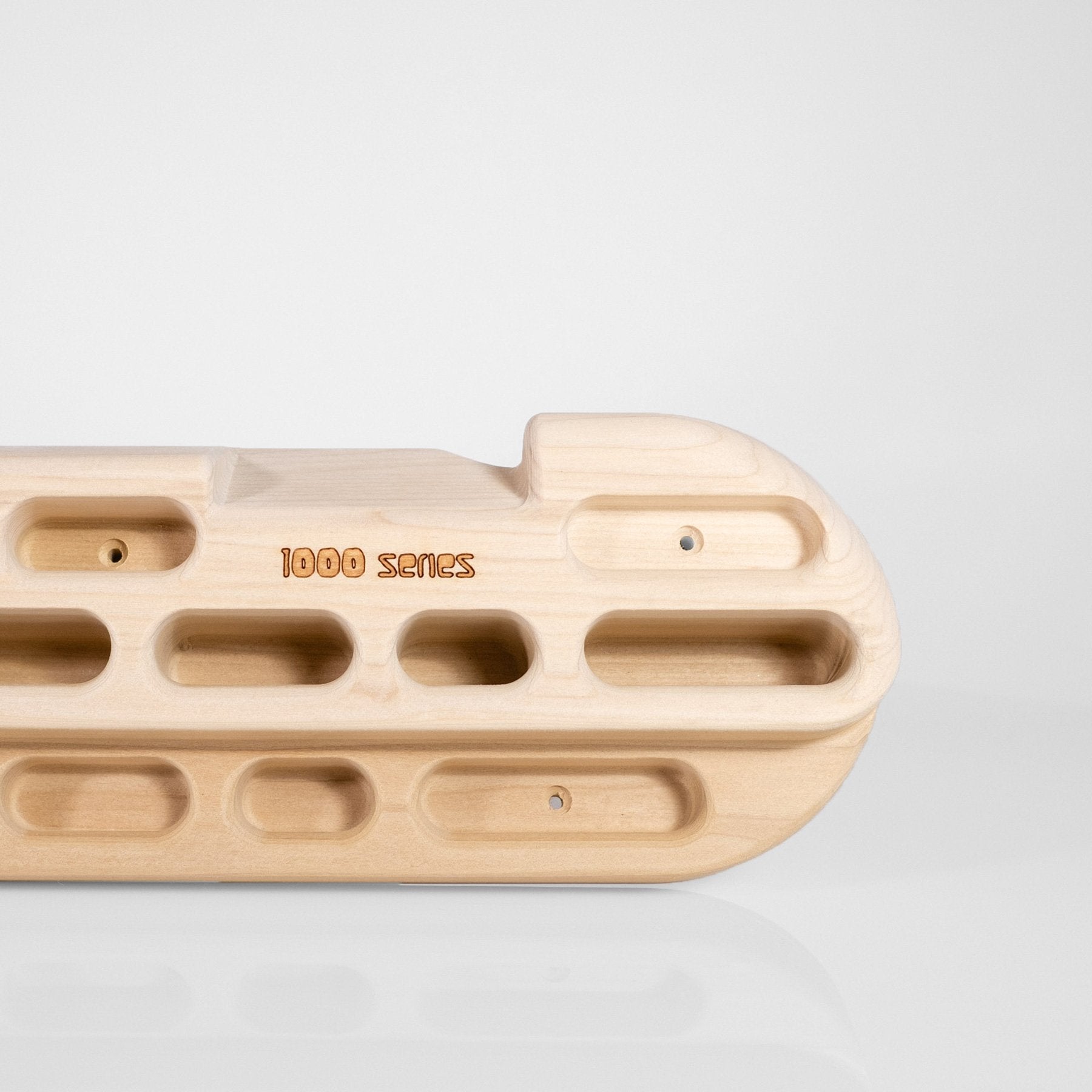 close up of So iLL distribution Beastmaker 1000 wooden climbing hangboard right side