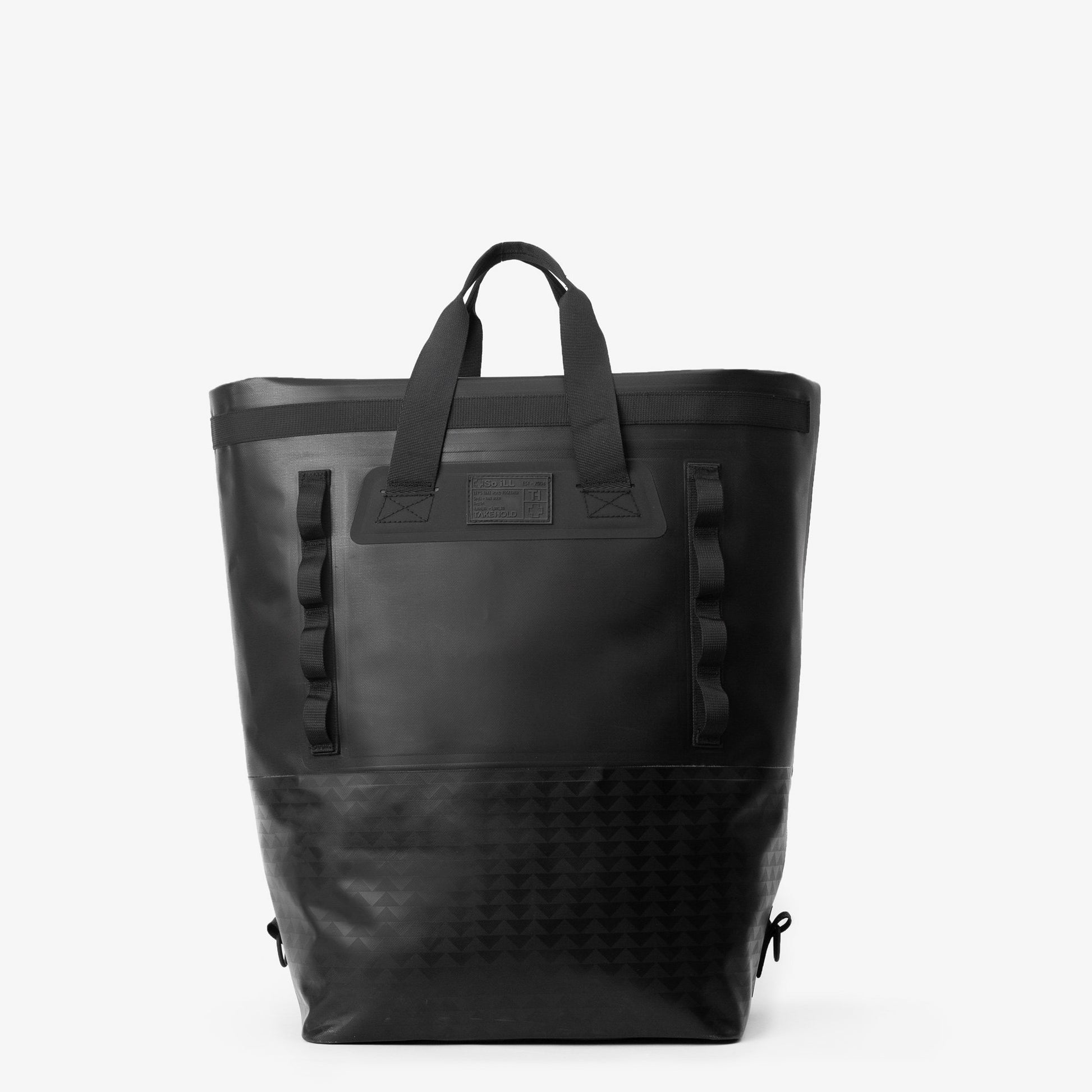 45L black wolf so ill x on the roam dirt bag is shown rolled down to be carried as a tote and from the front