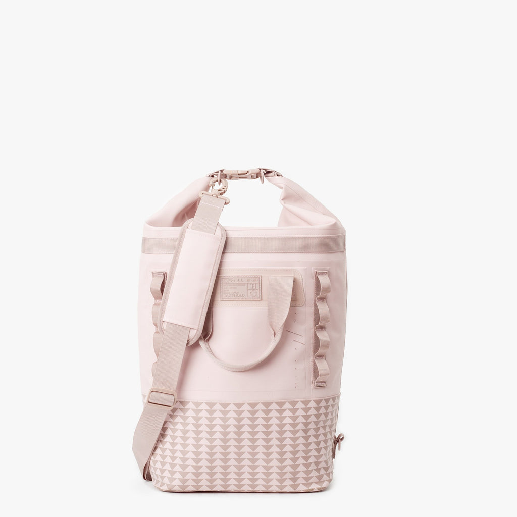 25L dirty pink so ill x on the roam dirt bag is shown rolled down to be water resistant and from the front