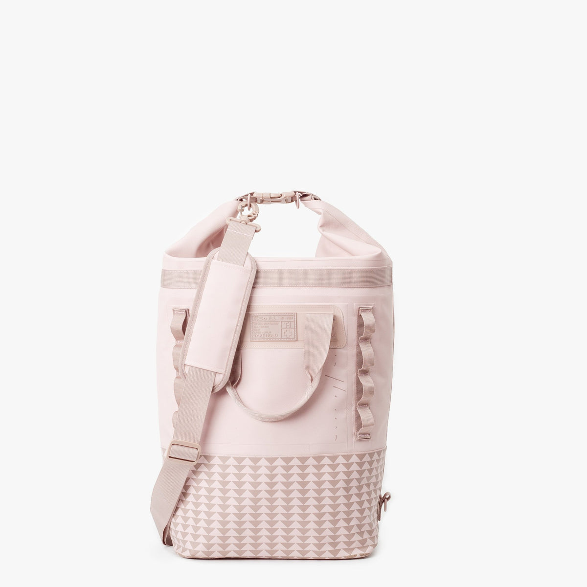25L dirty pink so ill x on the roam dirt bag is shown rolled down to be water resistant and from the front