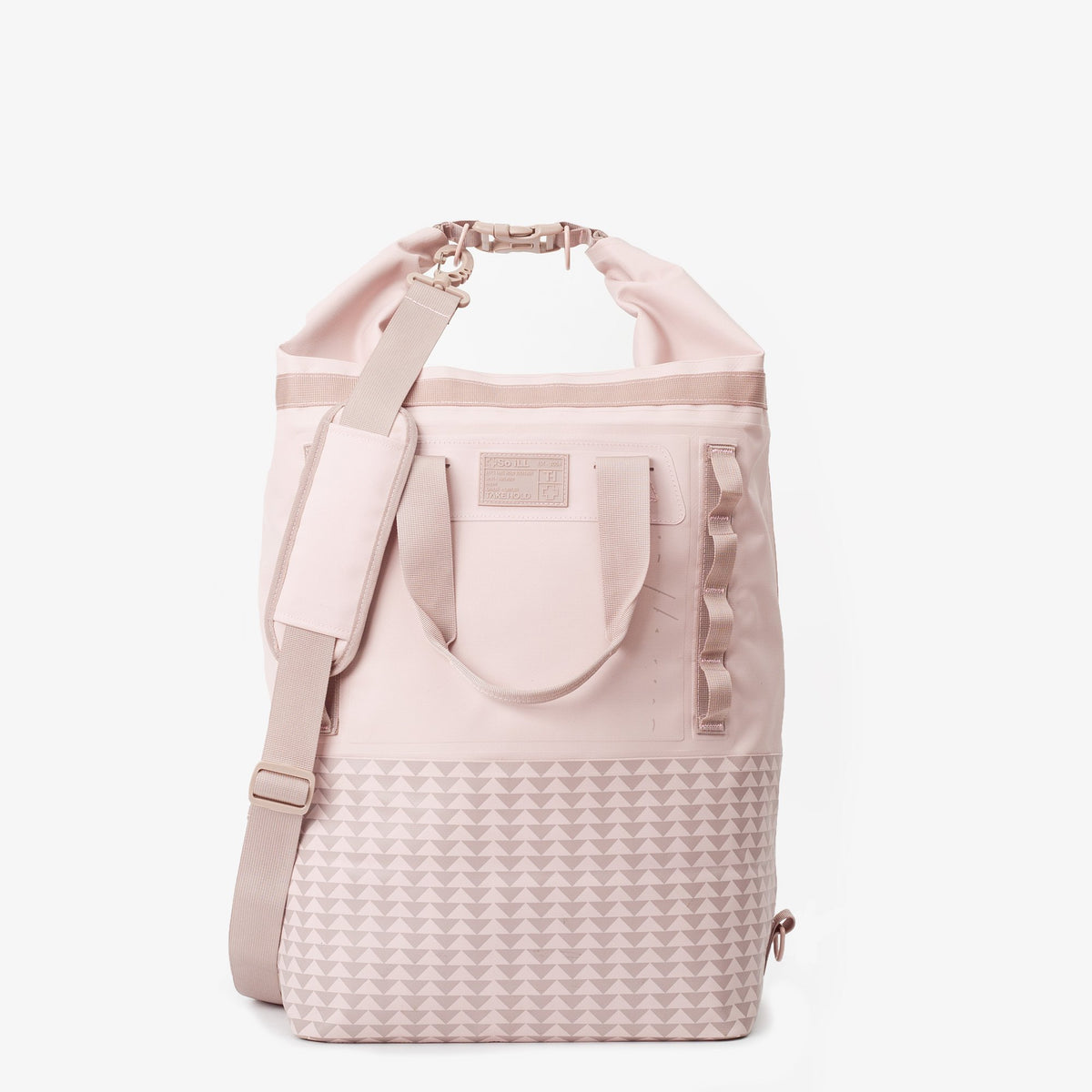 the 45L dirty pink so ill x on the roam dirt bag is shown rolled down to be water resistant
